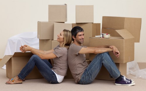 Professional movers handling furniture in a Waterloo apartment building