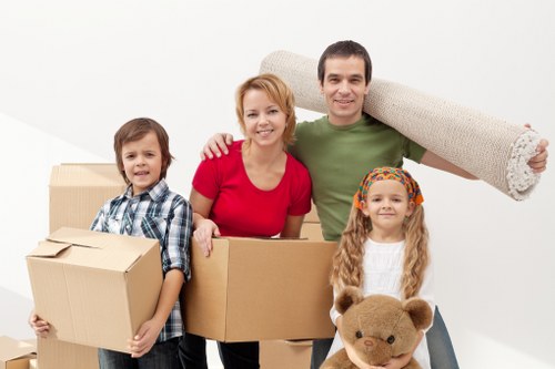Mover handling a family home move with transparent pricing details